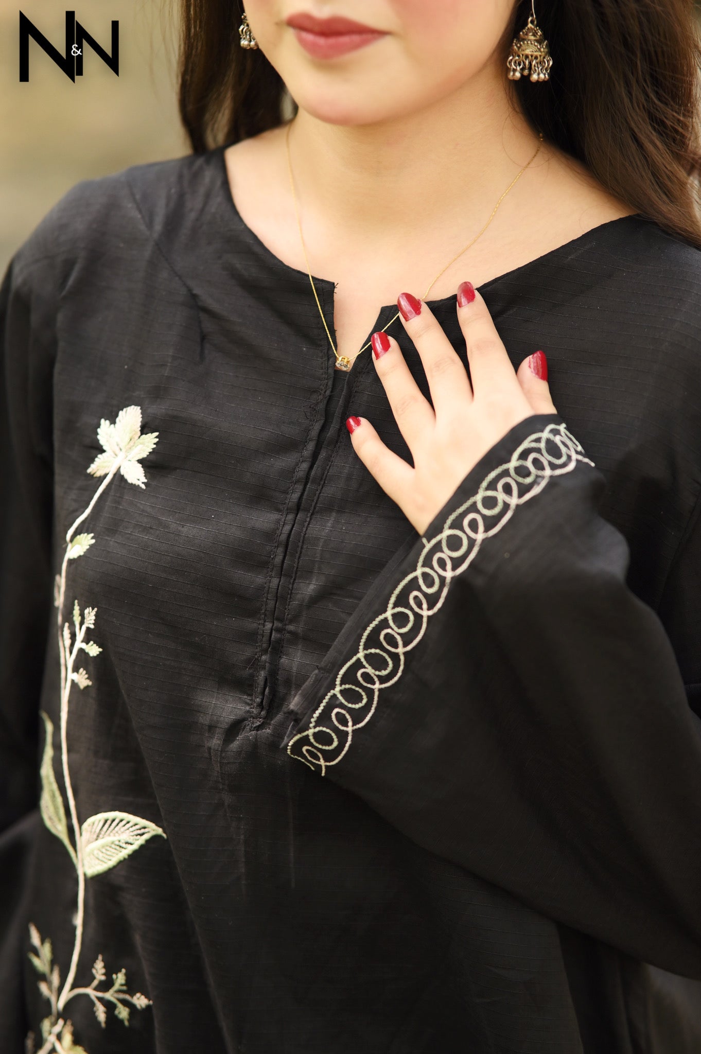Refined Comfort-Threadwork That Speaks in Black.