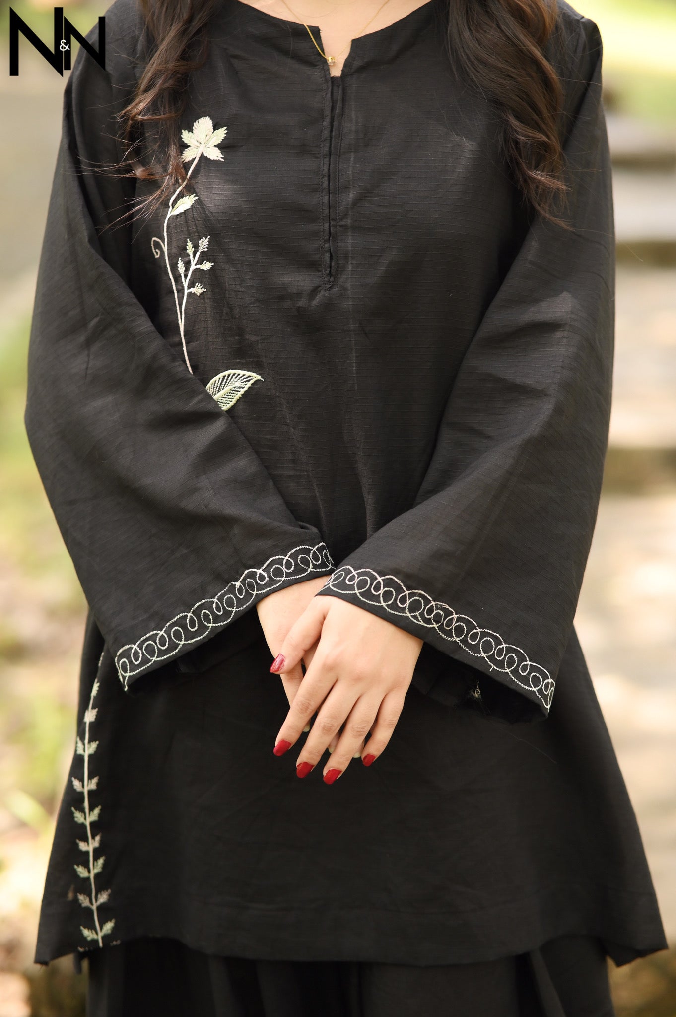 Refined Comfort-Threadwork That Speaks in Black.